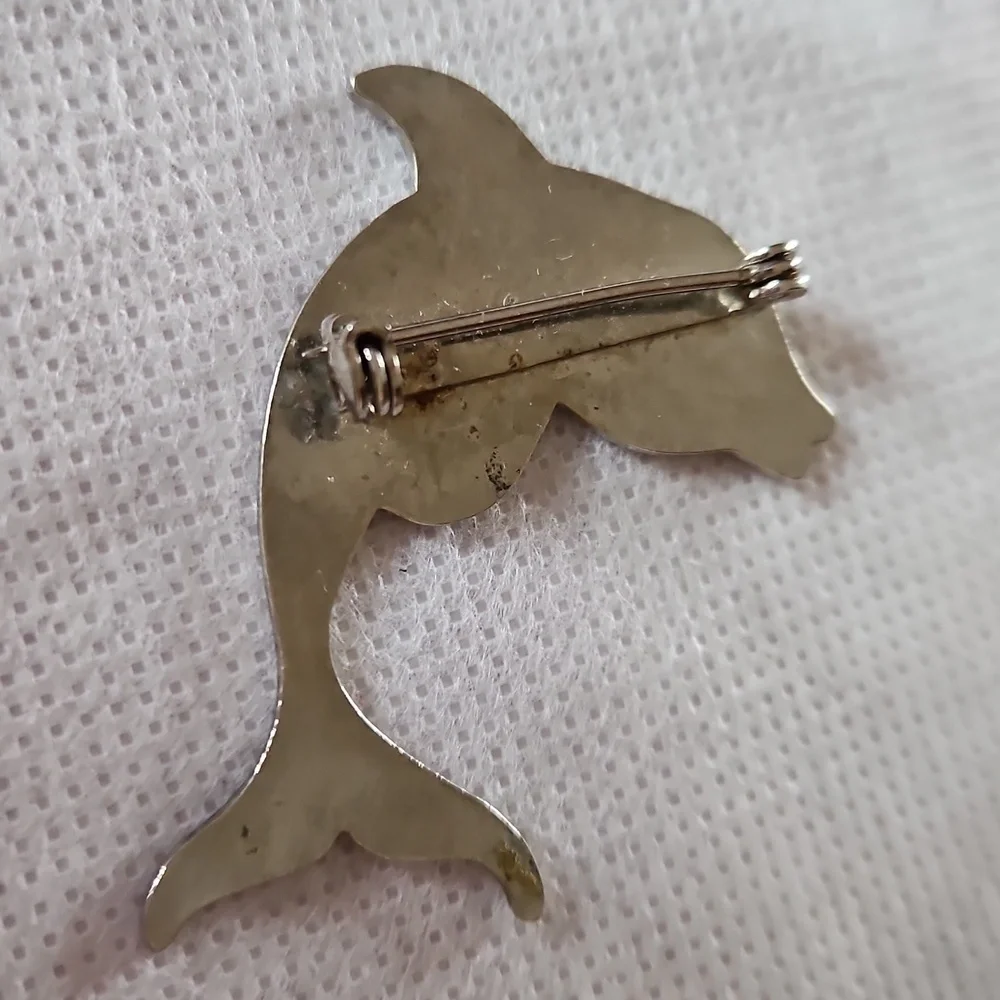 Silver Tone dolphin brooch, vintage 1990s